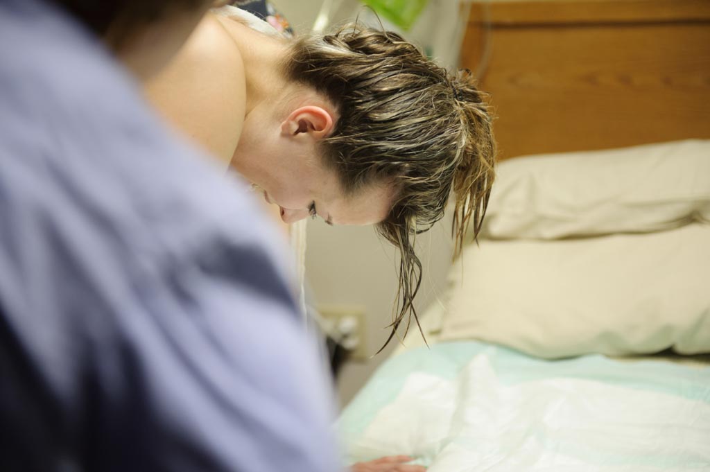 Pregnant woman preparing for childbirth and receiving pregnancy and birth support